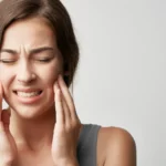 A woman using face scrub
