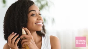 A woman using hair oil