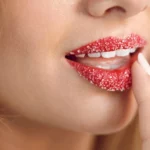 A woman wearing lip scrub