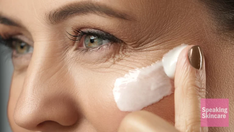 A woman using eye cream