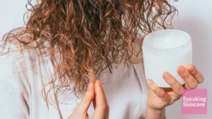 A woman using hair product