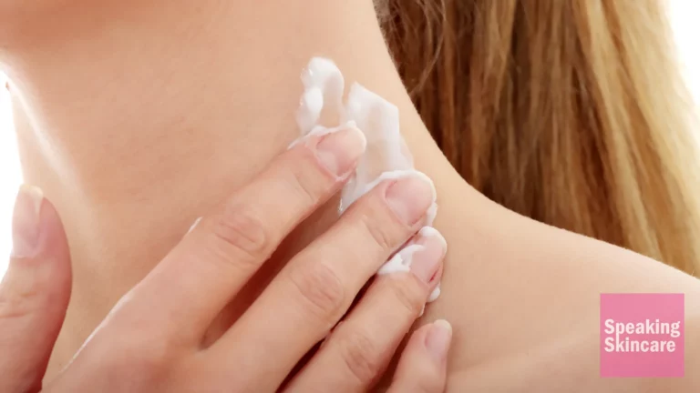 A woman using neck cream