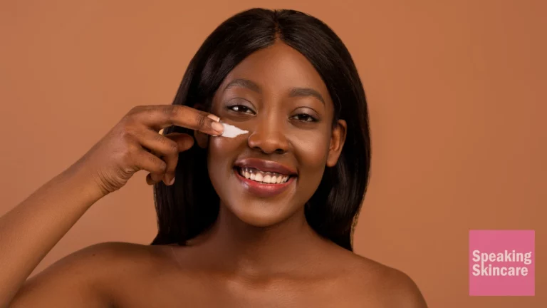 A woman using eye cream