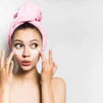 A woman using eye products