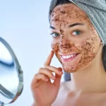 A woman using face scrub