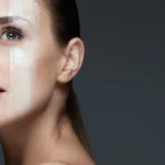A woman wearing face cream