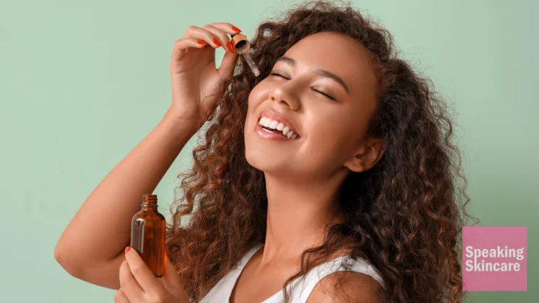 A woman using face serum