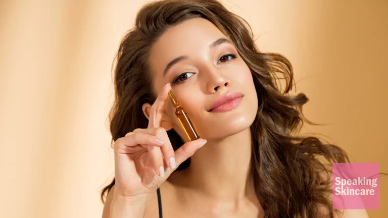A woman holding a serum
