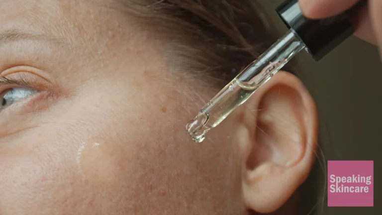 A woman using a serum