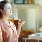 A woman in a clay mask