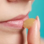 A woman using lip product