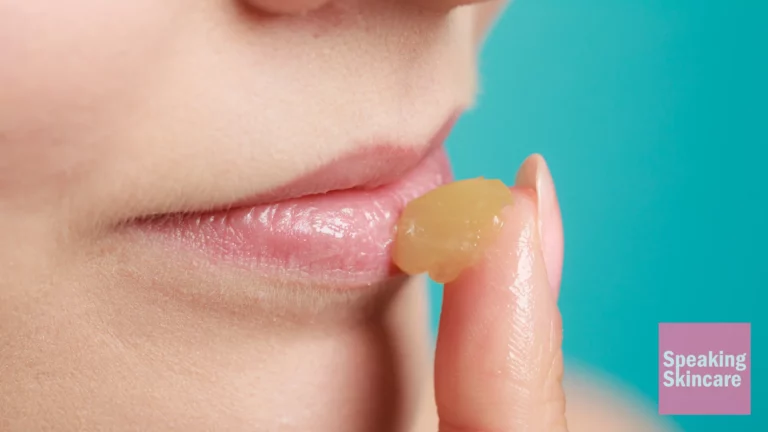 A woman using lip product
