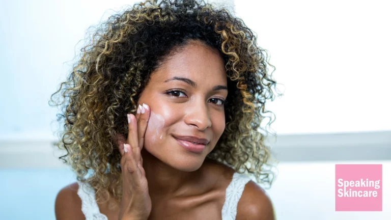 A woman using a face cream