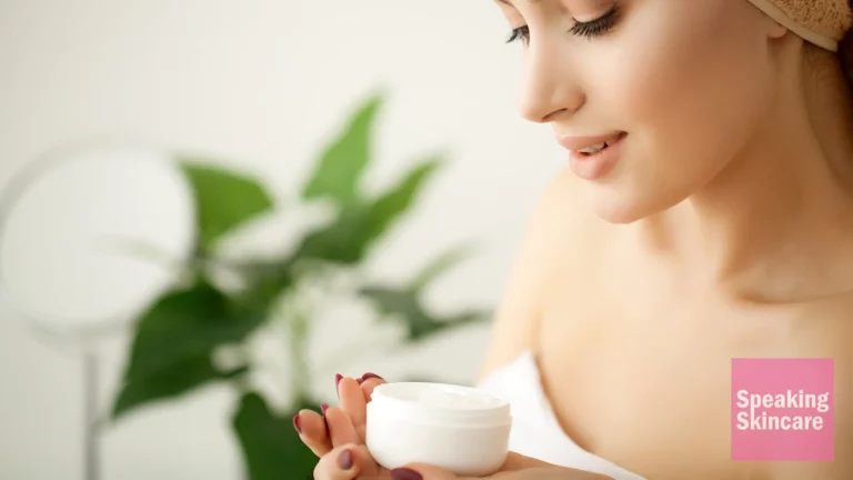 A woman holding a cream