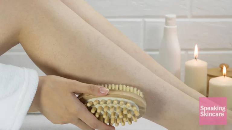 A woman brushing her legs
